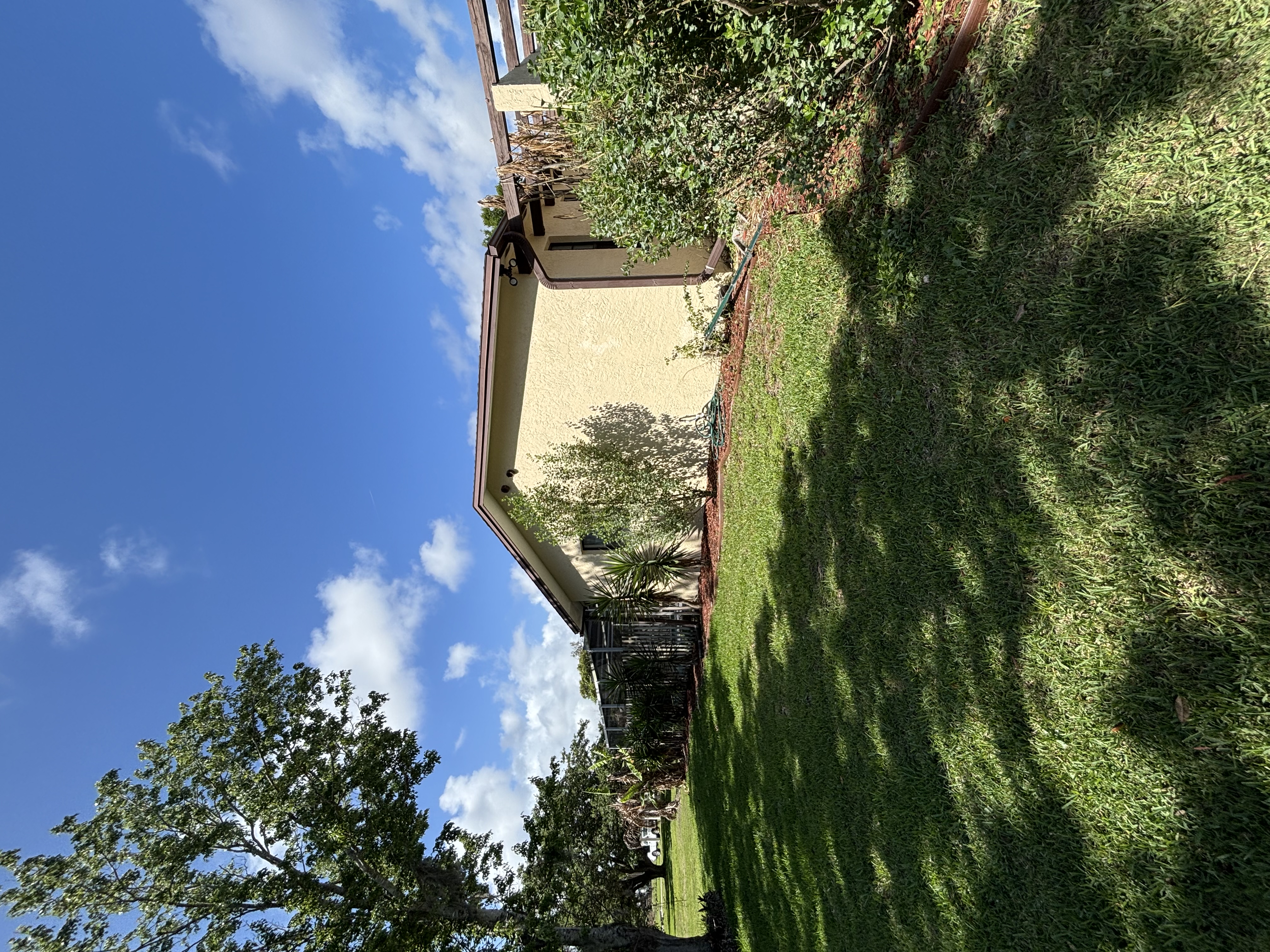 Professional lawn maintenance and mowing service in Melbourne FL by Pinewood Landscape & Design